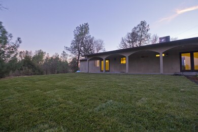 Covered Patio & Landcaped Backyard