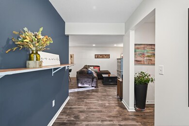 Hallway off front entry greets you with a unique reclaimed workbench shelf.