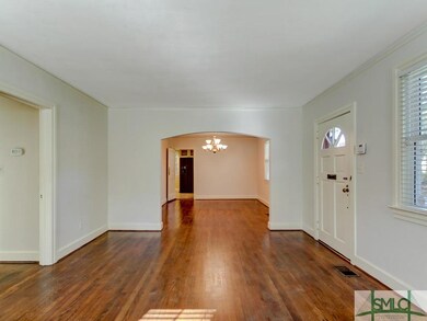 Living room view into the formal dining room and d