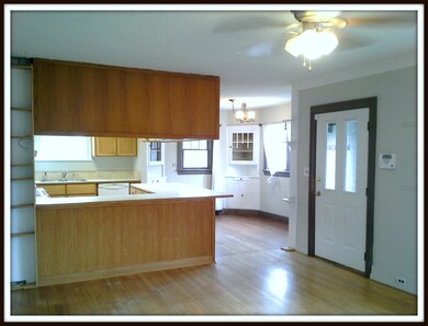 Open to kitchen and dining area