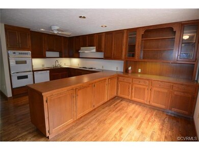 A delicious kitchen offers an abundance of custom 