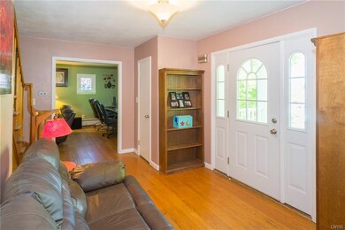 Entering the spacious foyer, these windows in the 