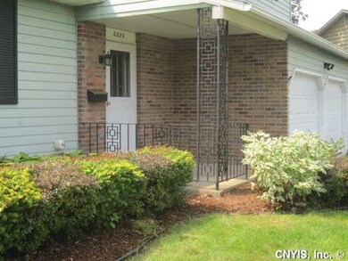 Exterior Front. The brick front on the covered fro