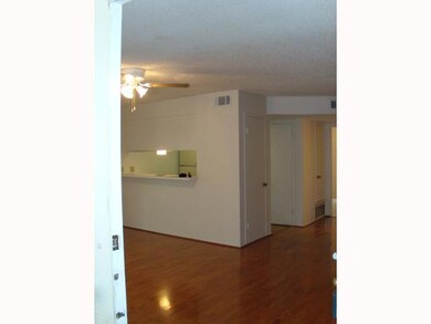 Unfurnished room with wood finished floors, visib