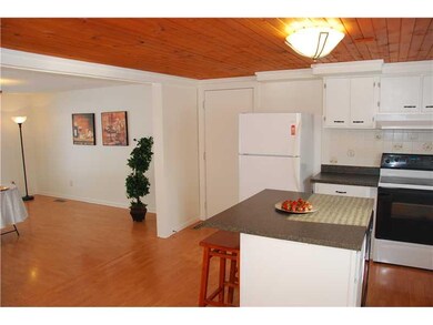 Exterior Front. Kitchen adjoins the dining room.