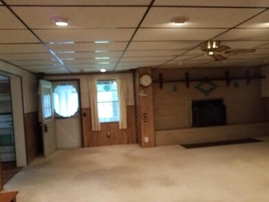 Family Room with attached 3 seasoned Roo
