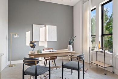 Office area featuring baseboards
