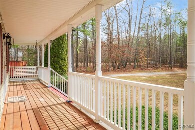 Wooden terrace featuring a porch