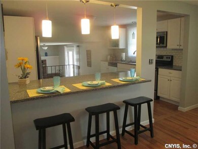 Kitchen. THE KITCHEN IS GLEAMING WHITE AND BRAND N