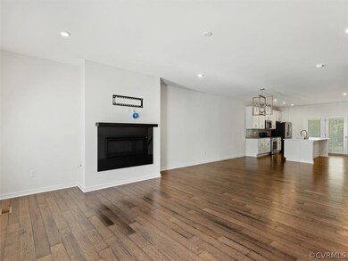 Custom Upgraded Granite Framed Gas Fireplace.