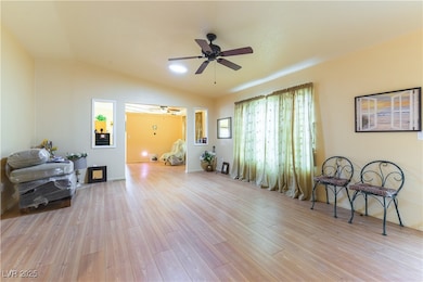 Living room with natural light and solar tube