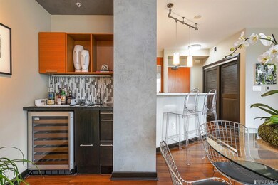 Wet bar and wine refrigerator in Living/Dining Room