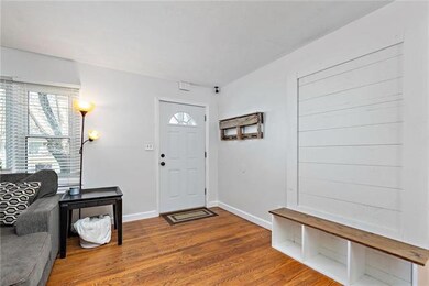 Front door entry with opening into spacious ranch 