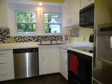 Kitchen. New ceramic tile floor, newer back splash
