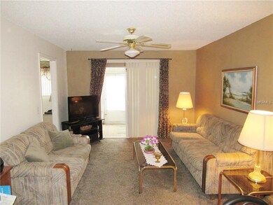 Lovely living room with access to enclosed porch a