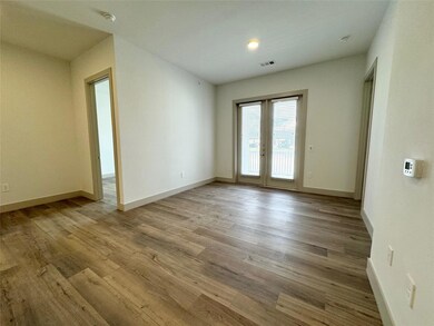 Unfurnished room featuring light hardwood / wood-s