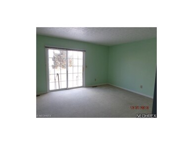 Living room leads to patio and nice private area