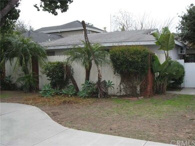 Front with gate that opens to back yard.