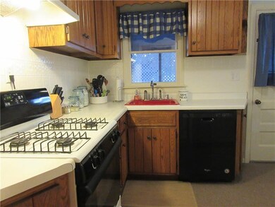 Updated kitchen, door that leads to the back porch