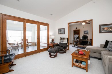 Office opens from great room and allows light from