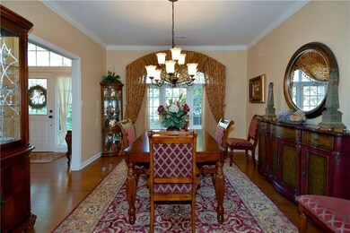 Dining Room:  Hardwood flooring, crown molding, ge