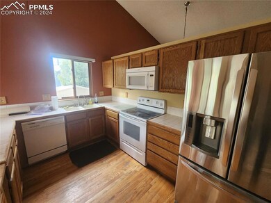 Kitchen featuring light hardwood / wood-style floo