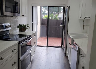 Fully updated, small eat in area, walk out to cour