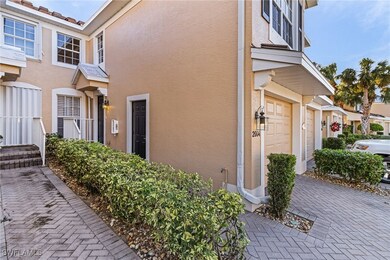 Entrance to property with stucco siding