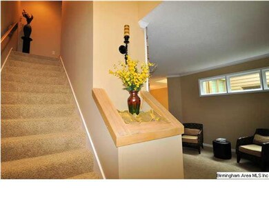 Tile foyer to living room and second level