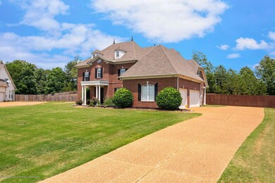 3 car garage with side friend entry