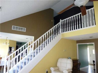 Spindle Staircase located between the Kitchen and 