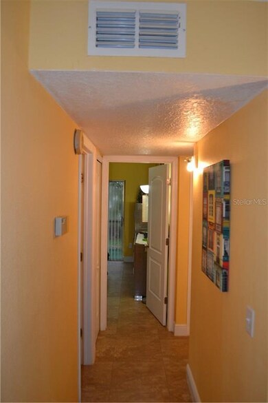 Ceramic Tile throughout home, textured ceilings an