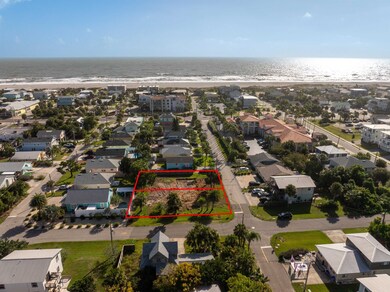 Aerial view of property's location featuring expansive coastline and property parcel outlined