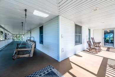 Reynolds 5 Porch swing and front door