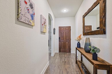 Doorway featuring hardwood / wood-style floors