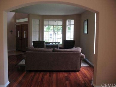 View from formal dining room into living room.  Go