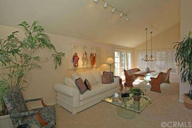 Spacious living room and dining room with French d