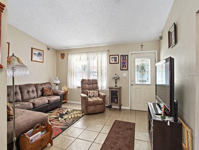 View of Living Room Looking back towards Front Doo