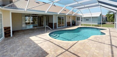 Pool with a view of covered outdoor seating area
