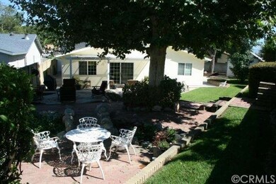 Backyard View of Top Tier Seating Area, Covered Pa