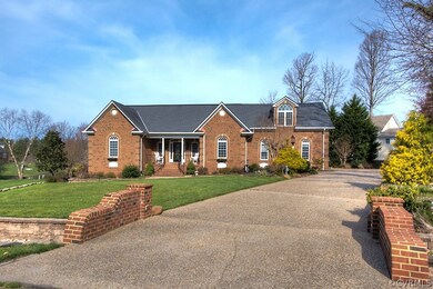 Great paved driveway with attached garage.