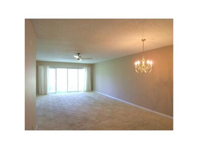 Living Room. Condo is being newly painted througho