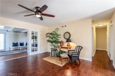 Living room area connects with additional room