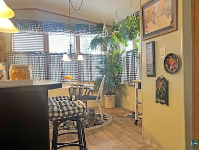 Dining area with hardwood / wood-style floors, an 