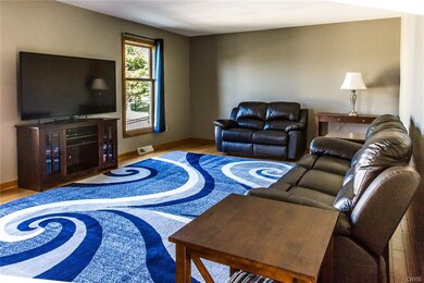 Spacious living room with beautiful hardwoods, lot