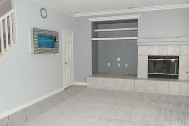 Family room features beautiful fireplace, entertai