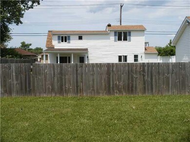 Exterior Front fully fenced yard for safe zone for
