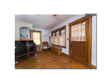 Living Room/Entry - gleaming hardwood floors and b