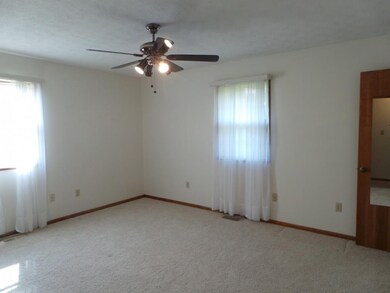 ONE OF THREE BEDROOMS