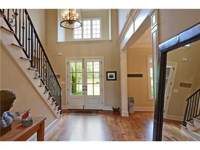 This warm, inviting Foyer features nail down hardw